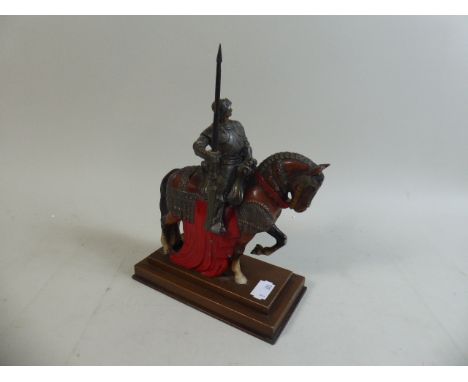 A Novelty Cold Painted Spelter Table Lighter in the Form of a Mounted Knight, 22cm high 