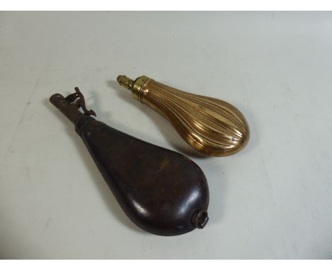 A 19th Century Leather Covered Shot Flask and a Brass Example 