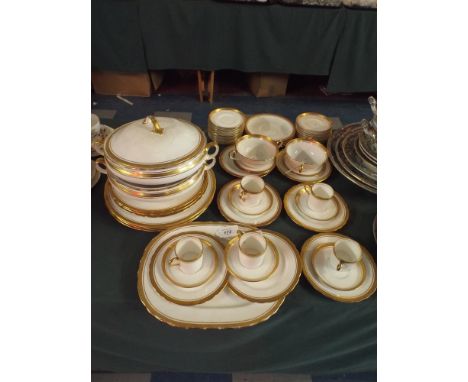 A Collection of Aynsley Gilt Bordered Coffee and Dinner Wares to Include Tureens, Dinner Plates, Side Plates, Coffee Cans and