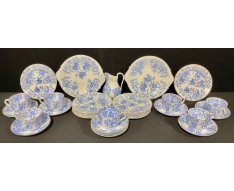 A 19th century Graingers Worcester Moss Fibre pattern part teas service, comprising milk jug, cake plates, side plates, cups 