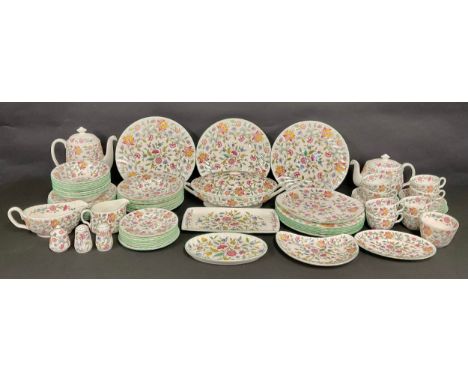 A Minton Haddon Hall pattern dinner and tea service for eight, comprising dinner plates, dessert plates, dessert bowls, side 