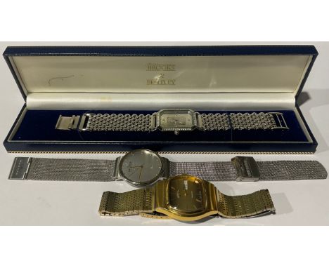 Three wristwatches to include a Brooks &amp; Bentley Credit Suisse 999.5 Platinum Ingot quartz wristwatch with stainless stee