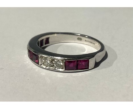 18ct White Gold Ruby and Diamond Half Eternity Ring the ring is set with six approx. 2.5mm diameter princess cut deep pink ru