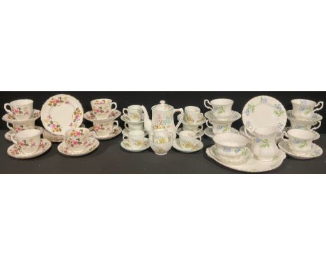A Richmond Blue Poppy pattern tea service; an H &amp; M Sutherland pattern coffee set; a Crown Staffordshire 18 piece service