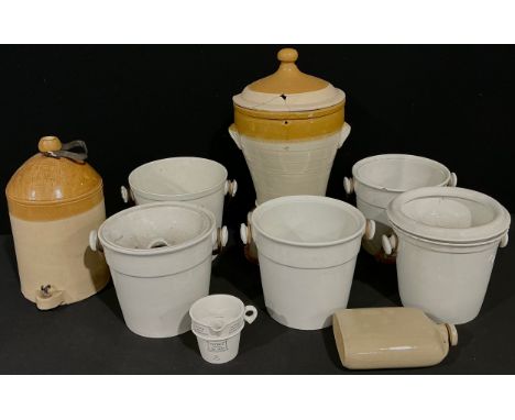 A Victorian two-tone stoneware water filter, three gallon, J. Bourne &amp; Sons, Denby, applied with coat of arms, 60cm high;