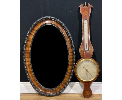 An Edwardian inlaid mahogany barometer, cream/silvered dial and scale, signed, G Bellatti Burton, 97cm high;  an oval wall mi