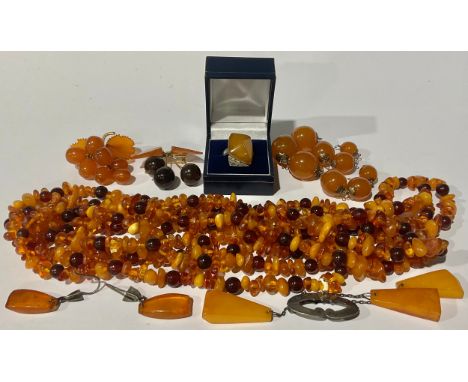 A selection of Russian "875" stamped Silver Amber Jewellery and a single strand multicoloured Baltic Amber chip/bead necklace