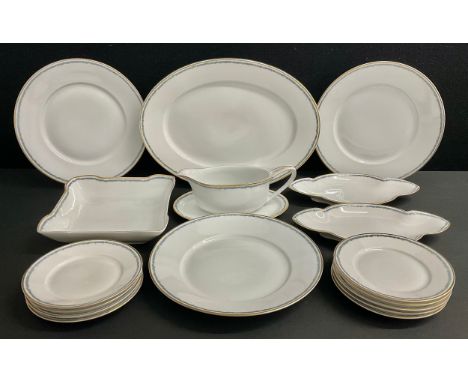 A Rosenthal part dinner set banded with blue and green floral collar, gilt lip, inc three dinner plates, nine side plates, tw