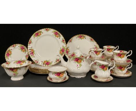 A Royal Albert Old Country Roses pattern tea service for six, comprising teapot, cake plate, side plates, cream jug, sugar bo