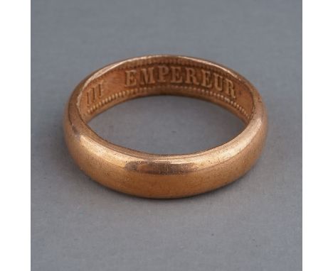 A rose gold ring, of plain design, the inner shank inscribed 'NAPOLEON EMPEREUR III 1861', size R, gross weight approx 3.9g