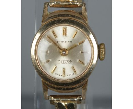 A ladies 9ct gold Everite manual watch with yellow metal expanding strap.  