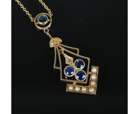 A 9ct gold sapphire and seed pearl necklace. Pendant drop approximately 4cm, Chain unclasped 42cm.  Seed pearl missing above 