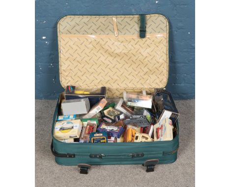 A suitcase full of mostly boxed diecast vehicles including Lledo, Corgi, Stevelyn, Days Gone Vanguards, Exclusive First Editi
