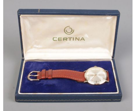 A Gents Certina Jubile 9ct Gold manual wind wristwatch, on brown leather strap. With presentation back plate for 50 years of 