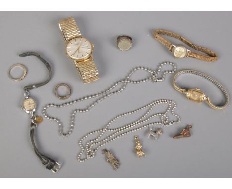 A small collection of jewellery. Includes silver chain, silver ring, Rotary quartz wristwatch, ladies manual watches, etc.  