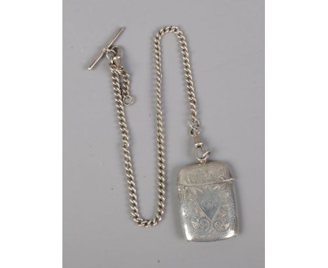 A silver vesta case, monogramed ER to front, with albert chain. Total weight 35g, hallmarks various.  