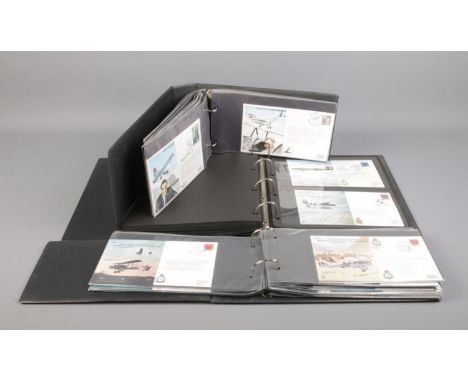 Three albums containing a good quantity of RAF signed/unsigned first day covers. Approximately 136 covers in total.  