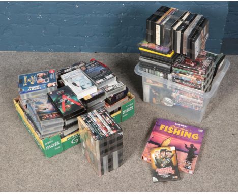 A large collection of DVD's and VHS including The Lord of the Rings, Titanic, Gladiator, etc.  