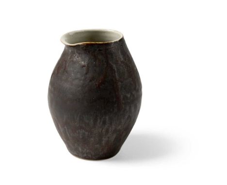 § Dame Lucie Rie (British 1902-1995) Pouring Vessel, circa 1958 impressed artist's seal, porcelain, manganese glazeDimensions