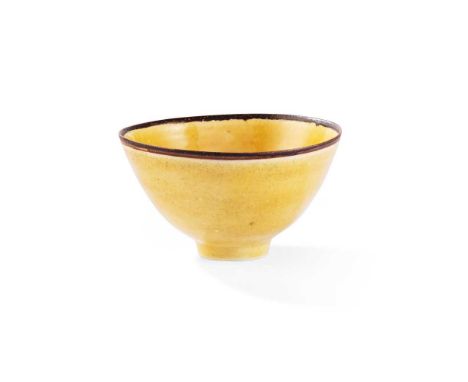 § Dame Lucie Rie (British 1902-1995) Footed Bowl, circa 1960-5 impressed artist's seal, porcelain, uranium yellow with fine m