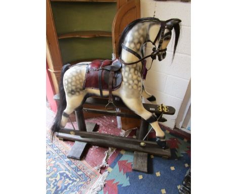 Quality wooden rocking horse by the Worcester Rocking Horse Co (H: 123cm L: 123cm)