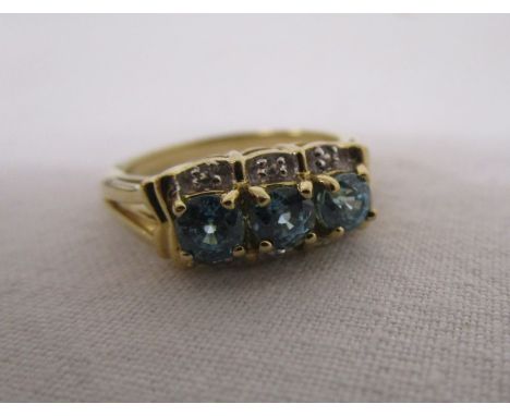 Gold blue topaz &amp; diamond ring