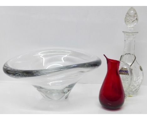 A large, heavy Dartington Crystal bowl, a decanter with silver plated Brandy label and a cranberry glass jug (3) 