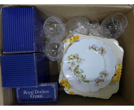 Ten Royal Doulton crystal glasses (six boxed) and a small collection of plates and saucers **PLEASE NOTE THIS LOT IS NOT ELIG