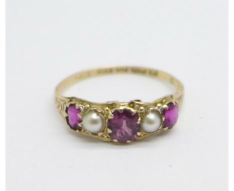 A Victorian 12ct gold, garnet and pearl five stone ring, Birmingham 1874, 1.1g, N 