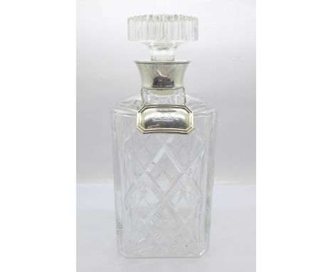 A silver mounted glass decanter with a silver 'Port' label, (bottom of stopper chipped) 