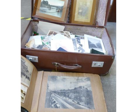 A case of vintage photographs and ephemera including an album circa 1900-1920, military and other subjects 