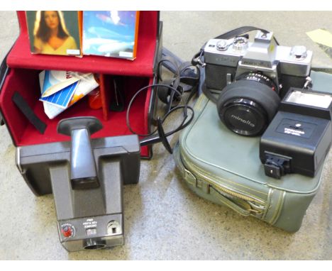 A Minolta SRT201 camera, Polaroid Super Swinger land camera with box, filter lens, flash gun, etc. 