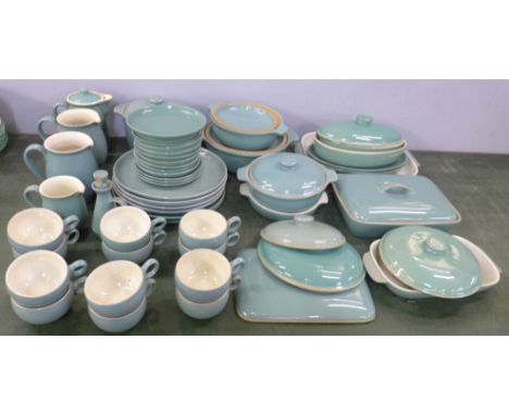 A collection of Denby stoneware table and ovenwares, cups, saucers, plates, hot water jug, other jugs and extra lids, (53), s