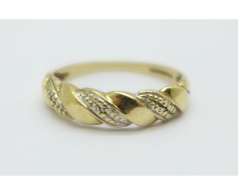 A 9ct gold and diamond ring, 2g, R 