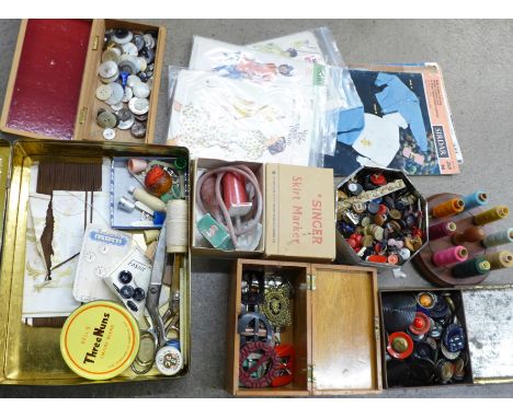 Vintage sewing items; tins of buttons, cotton stand, buckles, patterns, etc. 