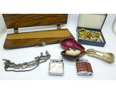 A carved pipe, two lighters, tie-press, cufflinks, etc. 