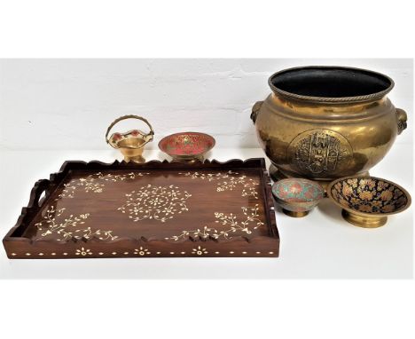 CARVED TEAK TRAYwith a shaped border and inset bone, 47.5cm long, together with four brass and enamel small bowls and an embo
