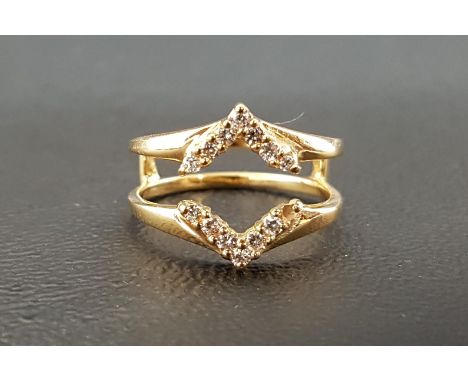 UNUSUAL DIAMOND SET RINGthe diamonds in opposing chevron shaped setting around a pierced centre, in fourteen carat gold, ring