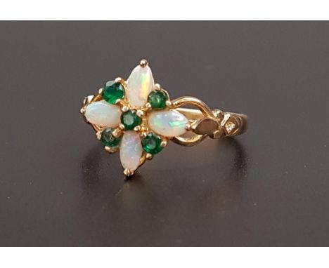 UNUSUAL OPAL AND EMERALD CLUSTER RINGthe four oval cabochon opals separated by round cut emeralds, on nine carat gold shank, 