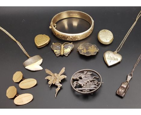 SELECTION OF VINTAGE JEWELLERYincluding a gold plated bangle with engraved scroll decoration and safety chain; an Egyptian si