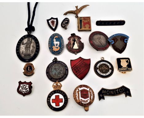 INTERESTING SELECTION OF VINTAGE BADGES AND MEDALSsome with enamel detail, including a Certified Midwife medal, engraved to t