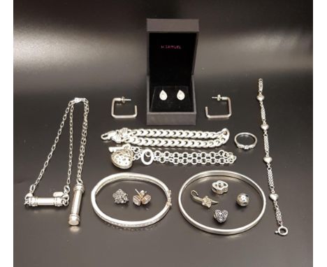 SELECTION OF SILVER JEWELLERYincluding a Pandora Sparkling Angel Wings ring, a pair of Pandora earrings and two Pandora charm