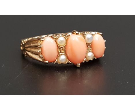 GRADUATED CORAL AND PEARL RINGthe three oval coral cabochons separated by seed pearls, on nine carat gold shank, ring size Q 