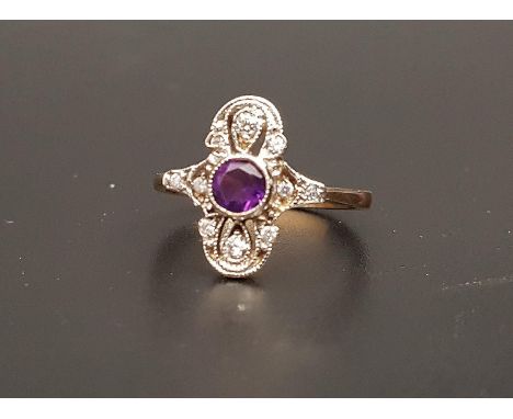 ART DECO STYLE AMETHYST AND DIAMOND PLAQUE RINGthe central round cut amethyst approximately 0.4cts, in diamond set pierced an