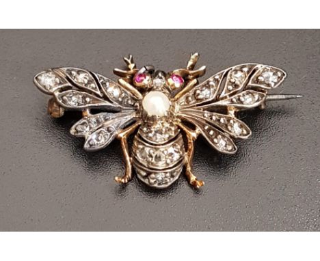 VICTORIAN DIAMOND, PEARL AND RUBY SET FLY BROOCHthe central pearl surrounded by multiple diamonds to the lower body, wings an