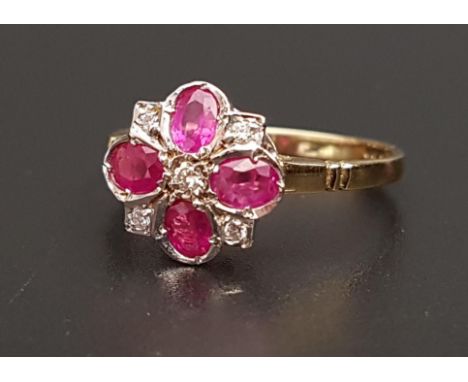 RUBY AND DIAMOND CLUSTER RINGthe four oval cut rubies separated by small diamonds, on eighteen carat gold shank, ring size N-