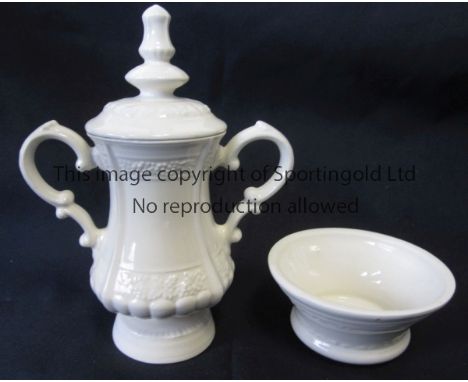 F.A. CUP        A ceramic china.,  9" in total, replica of the FA Cup. The Cup is engraved with the Football Association Chal