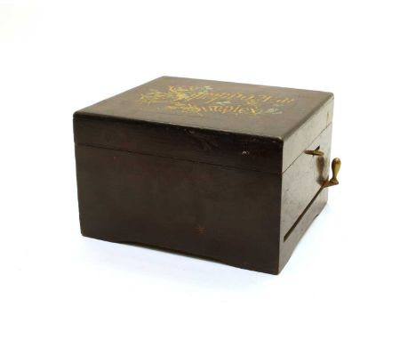 A Symphonion Simplex disc musical box, late 19th century, within jacaranda wood case with gilt lettering to lid, together wit