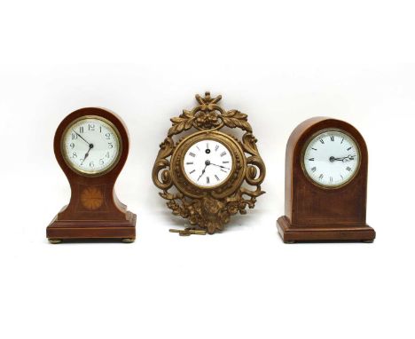An Edwardian inlaid mantle clock, a gilt French wall clock and an Edwardian inlaid balloon clock (3)Condition report: none ar