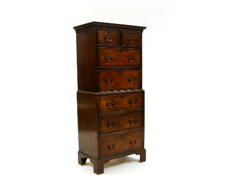 A small George III style mahogany chest or tallboy, early 20th century, the upper section with an arrangement of four drawers